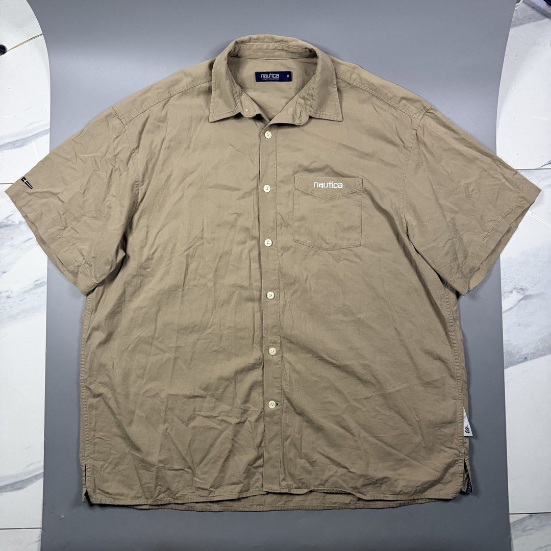 Nautica - Crest Buttondown Polo (Category: Tshirts & Polo Shirts ) located in Paranaque City. Submitted by millennial_goodz (Listing ID 1460654785, Image 1). Description: WTS Nautica - Crest Buttondown Polo Size Medium oversized Dimensions: 26" / 30" Excellent condition Authentic DM.