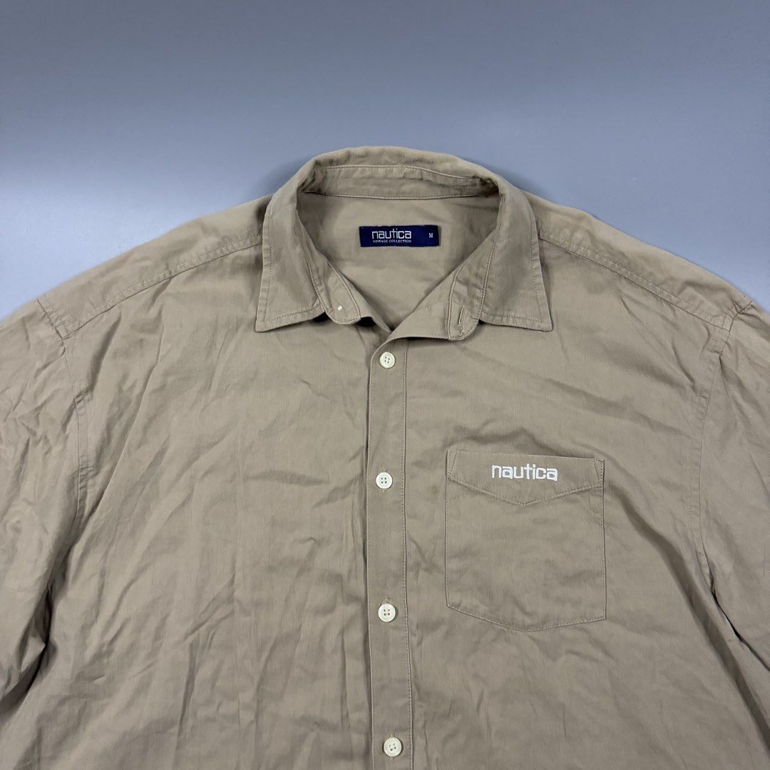 Nautica - Crest Buttondown Polo (Category: Tshirts & Polo Shirts ) located in Paranaque City. Submitted by millennial_goodz (Listing ID 1460654785, Image 2). Description: WTS Nautica - Crest Buttondown Polo Size Medium oversized Dimensions: 26" / 30" Excellent condition Authentic DM.