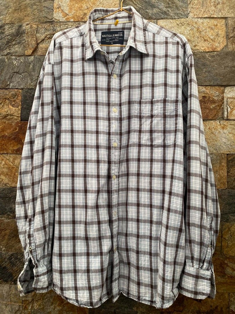 Nautica Plaid Checkered Long sleeve (Category: Activewear) located in Manila. Submitted by asiongmx (Listing ID 1460608108, Image 1). Description: FOR SALE ❗❗❗ Nautica Plaid Long sleeve Size XL on tag Made in Bangladesh Personal item Excellent condition Quezon City area DECLUTTERING Shipping @buyer's expense Lalamove / Jnt.