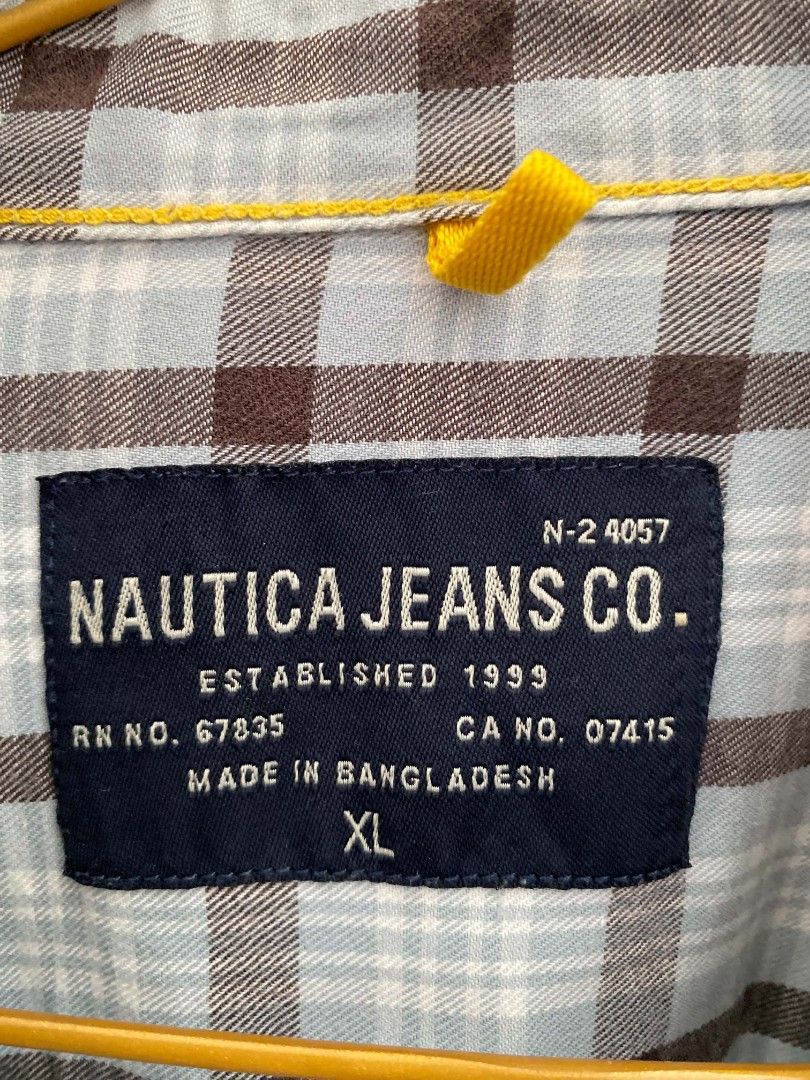 Nautica Plaid Checkered Long sleeve (Category: Activewear) located in Manila. Submitted by asiongmx (Listing ID 1460608108, Image 2). Description: FOR SALE ❗❗❗ Nautica Plaid Long sleeve Size XL on tag Made in Bangladesh Personal item Excellent condition Quezon City area DECLUTTERING Shipping @buyer's expense Lalamove / Jnt.