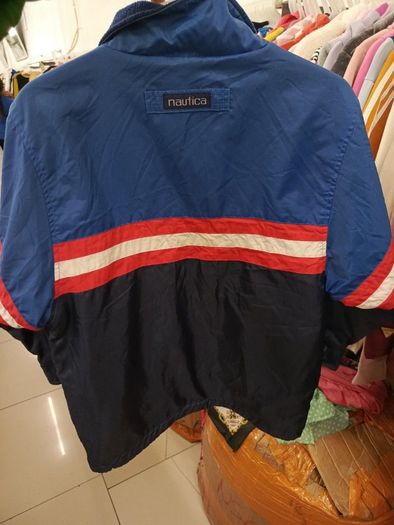 Nautica Reversible Fleece Lined Jacket (Category: Coats, Jackets and Outerwear) located in Cabatuan. Submitted by penthegreat (Listing ID 1460711108, Image 3). Description: - Classic Nautica jacket - Color: Blue with red and white stripes - Reversible design: One side is the classic blue, the other is a cozy fleece lining - Full zip closure - Two side pockets - Ideal for cooler weather and casual wear.