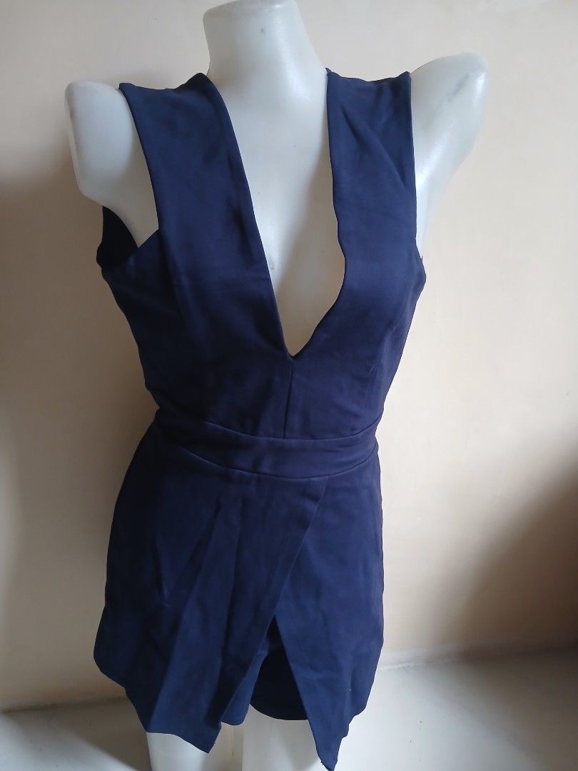 Navy Blue Cut-out Halter Neck Dress (Category: Dresses) located in Tayabas. Submitted by ahrcelllego (Listing ID 1460652152, Image 1). Description: - Stunning navy blue dress - Unique cut-out halter neck design - Flattering wrap-around waist - Beautiful fabric with a nice drape - Ideal for a night out or special occasion - Chic and modern style.