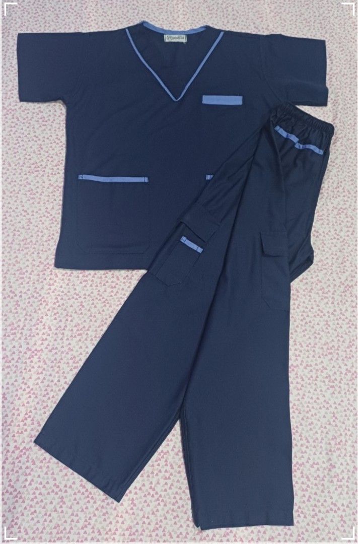 Navy Blue Scrub Set (Category: Sets or Coordinates) located in Quezon City. Submitted by bbernaddette (Listing ID 1460629667, Image 1). Description: Navy blue medical scrubs set rfs: no longer needed since may provided na uniform ang hospital - 2 sets available - cargo pants with elastic waist band - with chest pocket - with light blue piping design - size small 300 each get both for 500 only payment via gcash payment before delivery.