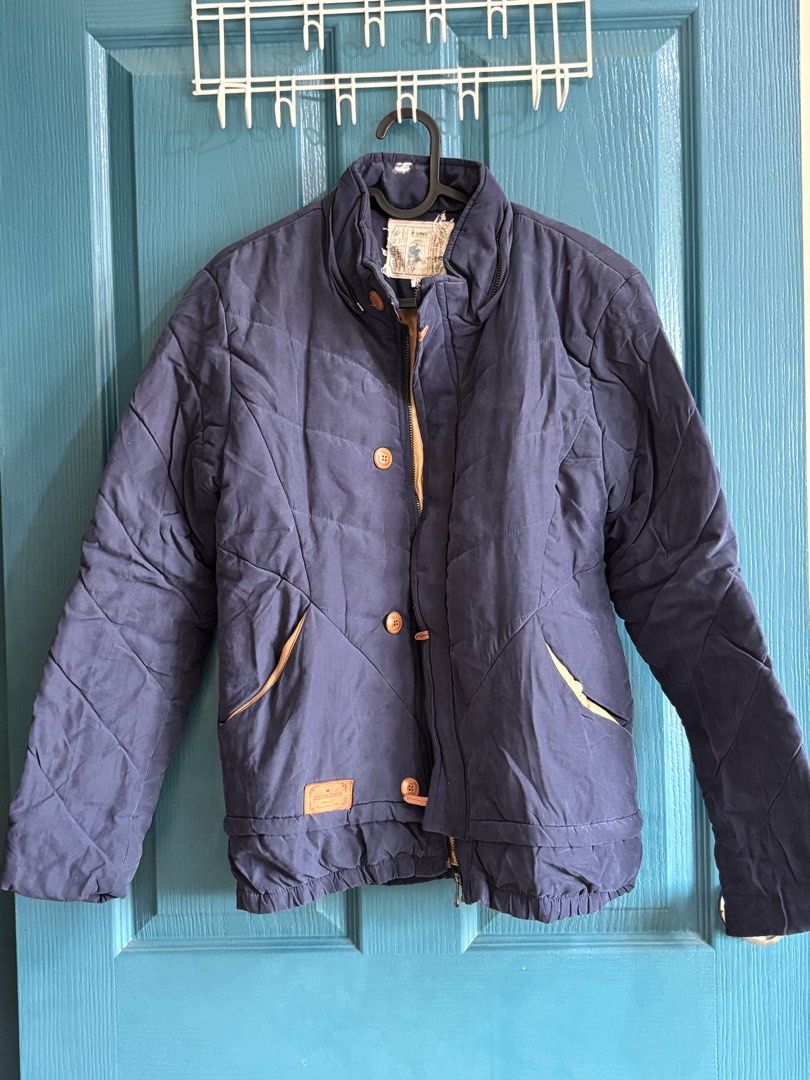 Navy Blue Thick Padded Jacket (Category: Coats, Jackets and Outerwear) located in Makati City. Submitted by yunivances (Listing ID 1460521749, Image 1). Description: Navy Blue Thick Padded Jacket For Winter and Autumn Trips No Hoodie With Zipper Fits Small to Medium.