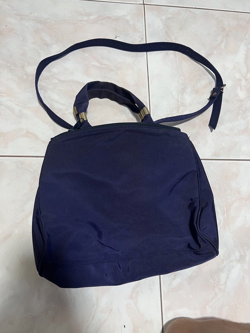 Navy blue tote/crossbody bag (Category: Cross-body Bags) located in Manila. Submitted by rlab_japan_thrift (Listing ID 1460590995, Image 2). Description: Vintage Dark Navy Blue Fabric Convertible Tote / Crossbody Bag 👜✨ Chic vintage Japanese bag in a rich dark navy blue fabric featuring a subtle fabric rose accent on the front. Offers versatile 2-way carrying—use the dual top handles or wear it as a crossbody with the long adjustable strap! * Co