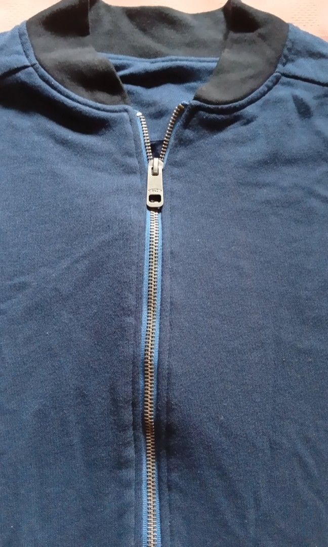 Navy Blue Zipper Jacket (Category: Coats, Jackets and Outerwear) located in Quezon City. Submitted by jojoleen28 (Listing ID 1460565630, Image 2). Description: Thick material, full inner layer. Soft cotton, stretch fabric. Measurements: Width 22" to 25" Length 25" Sleeve length 25" #Christmas2026.