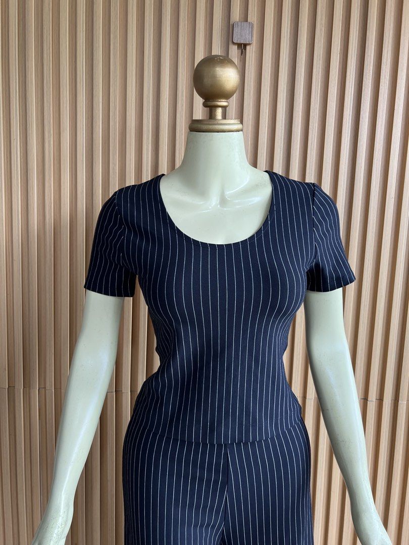 Navy Pinstripe Culotte Jumpsuit (Category: Jumpsuits) located in Lipa City. Submitted by thyra06 (Listing ID 1460650302, Image 3). Description: - Black coordswith white pinstripes - Short sleeves - Culotte-style pants - Simple scoop neckline - Comfortable and chic for everyday wear - Versatile for dressing up or down.