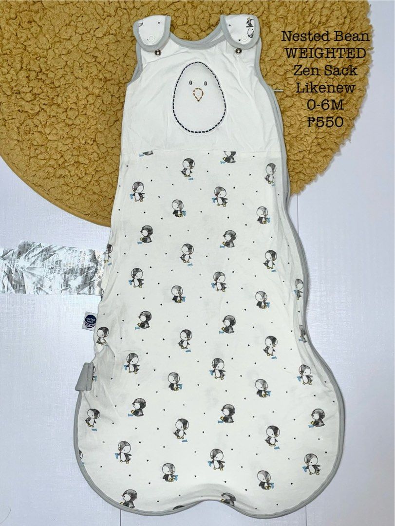 Nested Bean Weighted Zen Sack 0-6M Penguin Print (Category: Babies & Kids Fashion) located in Davao. Submitted by snuggleswaddle (Listing ID 1460590771, Image 1). Description: - Super cute penguin print Nested Bean Zen Sack - Weighted for better sleep - Size: 0-6 months - Gently used - Proven to help baby sleep better - Ideal for naps and nighttime sleep.