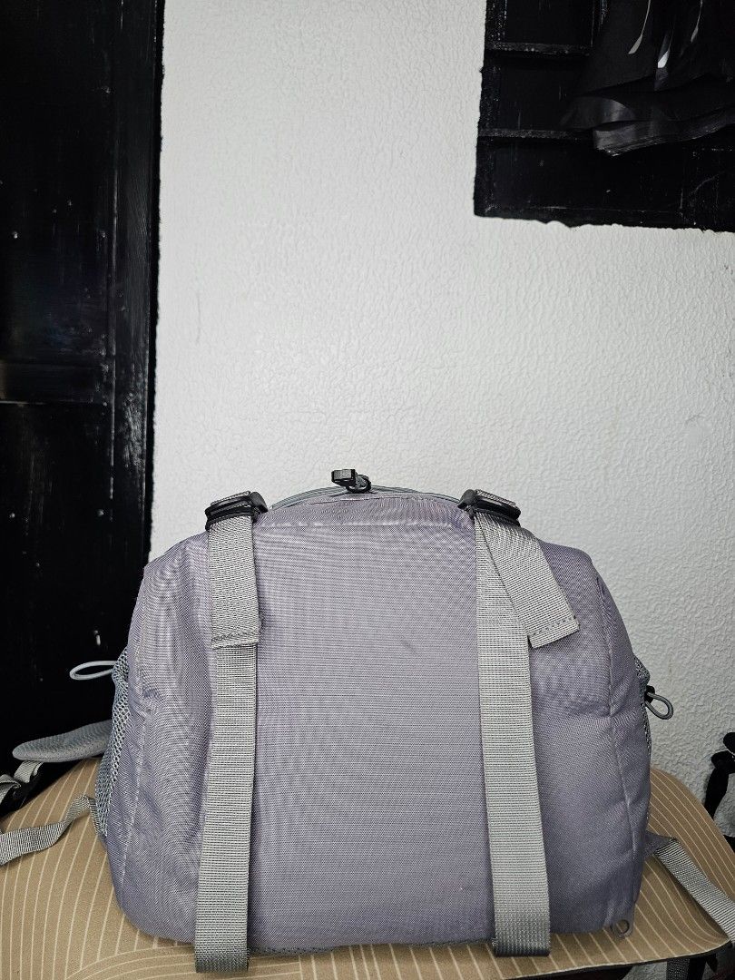 New Balance 2PIK V3 Backpack (Category: Backpacks) located in Baguio. Submitted by kayeonlineshop (Listing ID 1460570159, Image 2). Description: New Balance 2PIK V3 Backpack (Model: NBGCCAA103), featuring a light purple/lavender fabric exterior. Unisex Bagpack Measurements L-49cm W-41cm.