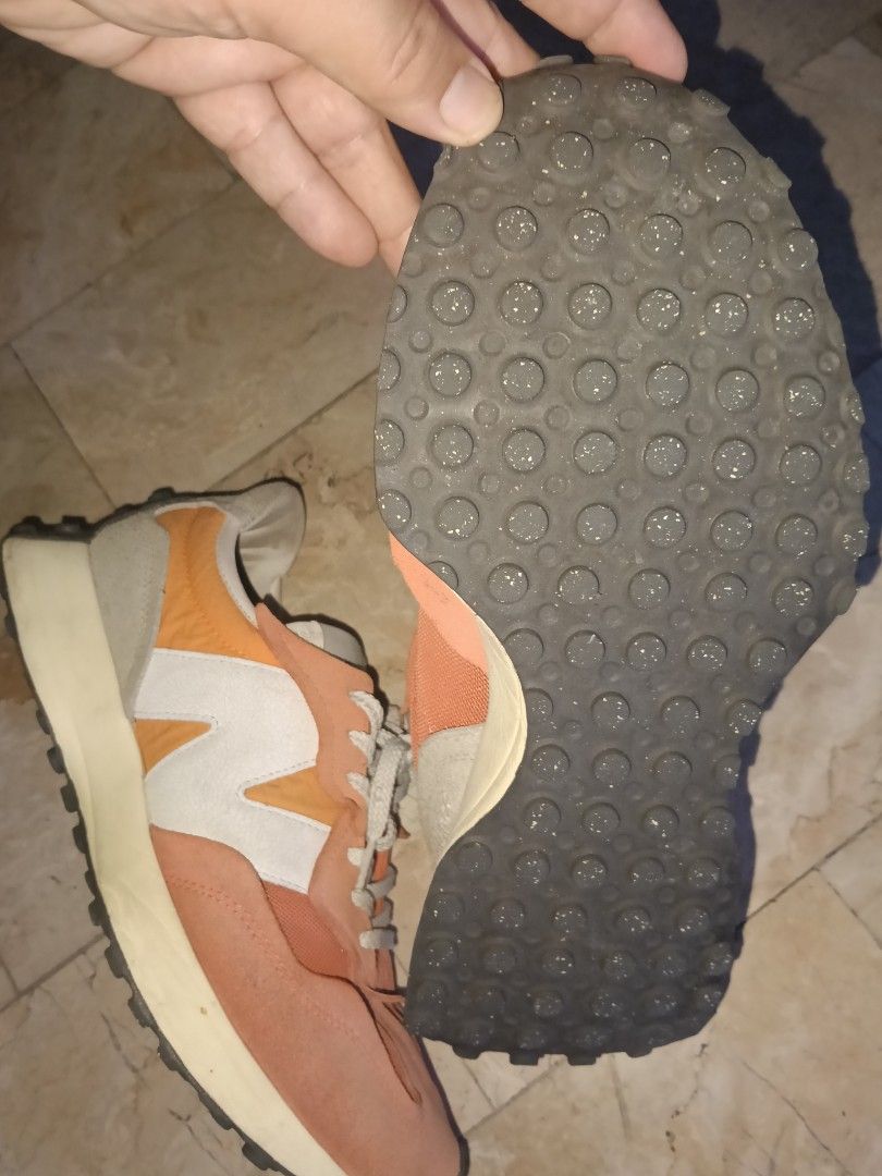 New Balance 327 size 11 (Category: Sneakers) located in Quezon City. Submitted by spicyphoenix (Listing ID 1460713617, Image 3). Description: - New Balance 327 sneakers - Color: Orange and Pink - Upper: Suede and Mesh - Features: Classic 'N' logo on side, grippy rubber sole - Laces: White - Condition: Gently worn, with plenty of life left. Please check photos for detailed condition. size 11 negotiable.