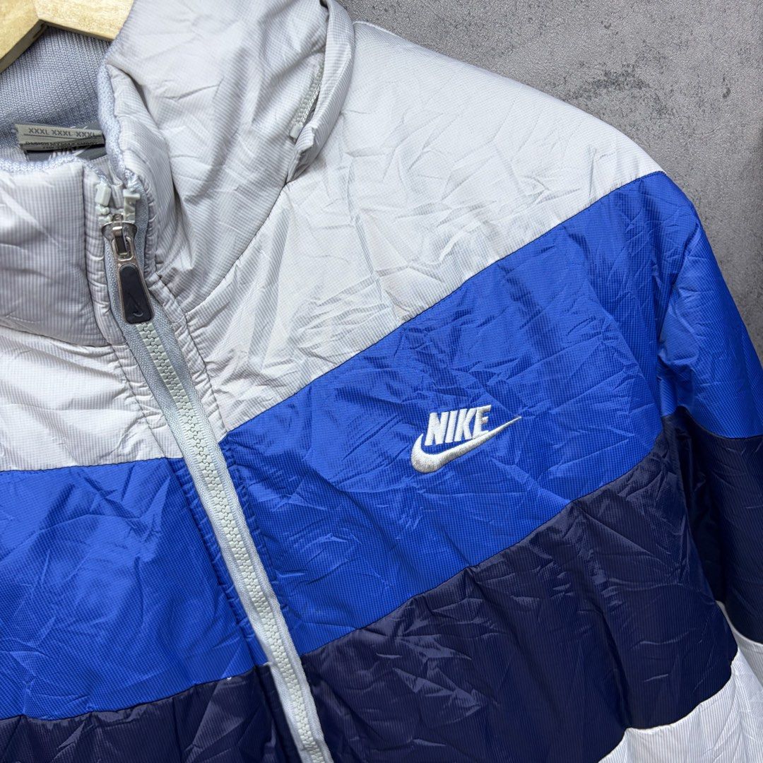 NIKE (Category: Coats, Jackets and Outerwear) located in Manila. Submitted by ruifinds (Listing ID 1460683175, Image 3). Description: -Y2k 2011 Nike Zip-Up embroidered logo Puffer Jacket (removable zip hood) size: XL width: 24 length: 28 condition: excellent color rate: 9/10 issues: light mark (can remove) price: 2000 (nego) + plus shipping fee.