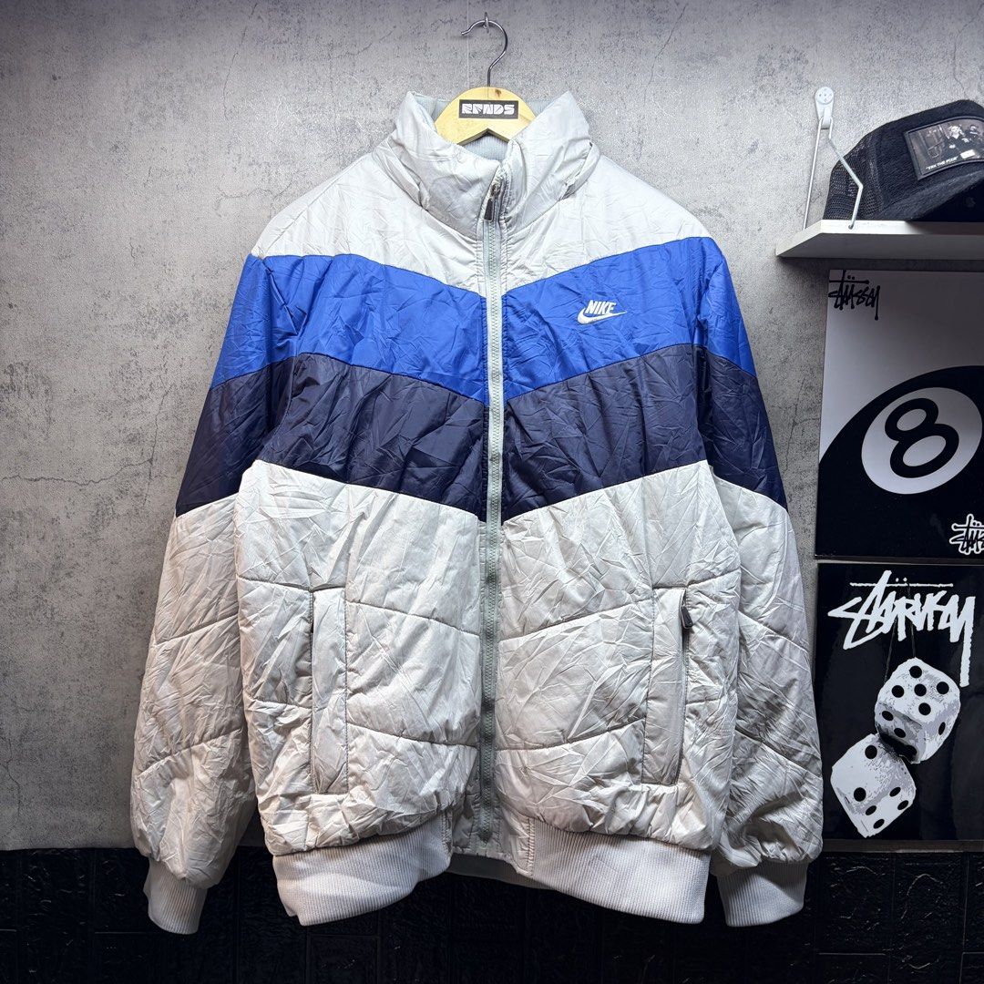 NIKE (Category: Coats, Jackets and Outerwear) located in Manila. Submitted by ruifinds (Listing ID 1460683175, Image 2). Description: -Y2k 2011 Nike Zip-Up embroidered logo Puffer Jacket (removable zip hood) size: XL width: 24 length: 28 condition: excellent color rate: 9/10 issues: light mark (can remove) price: 2000 (nego) + plus shipping fee.