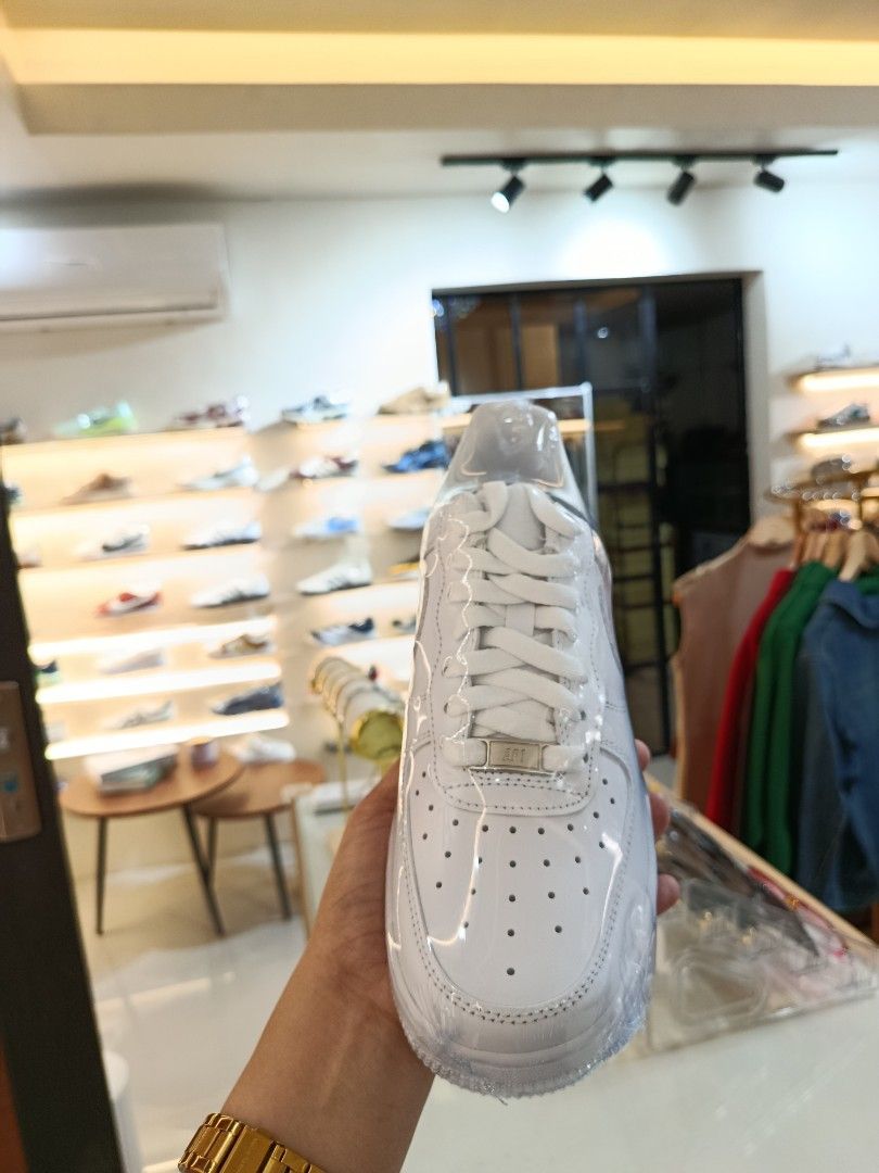 Nike Air Force 1 Low White Patent Leather (Category: Sneakers) located in Bulacan. Submitted by francia.luxe_237 (Listing ID 1460599399, Image 2). Description: -Authentic Classic white Nike Air Force 1s - Low-top silhouette - Shiny patent leather finish - Includes original laces - Essential for any sneaker collection - Easy to style with any outfit - Perfect for casual wear.