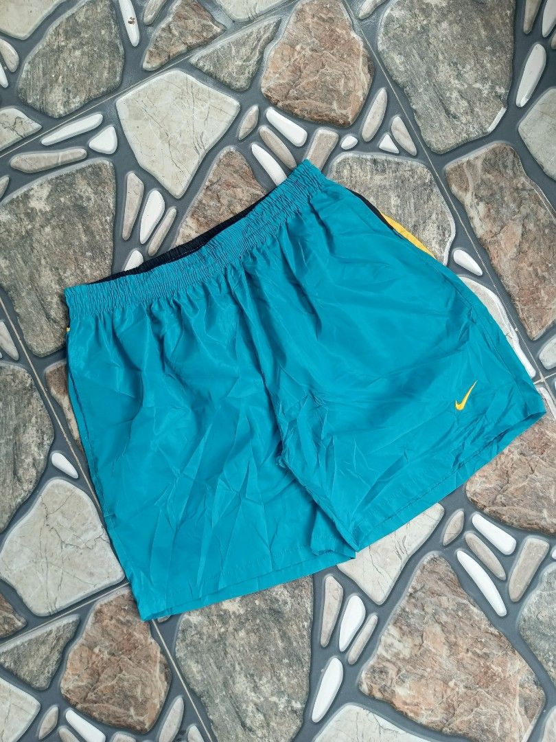 Nike big swoosh short (woven) (Category: Activewear) located in Baggao. Submitted by thriftislife123 (Listing ID 1460509817, Image 2). Description: w: freesize l:18 leg open:12 issue:no washtag off/legit pm for more details.