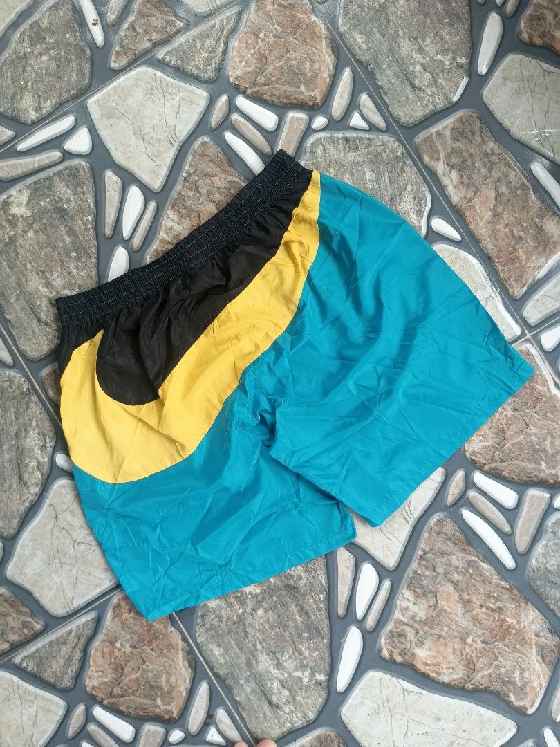 Nike big swoosh short (woven) (Category: Activewear) located in Baggao. Submitted by thriftislife123 (Listing ID 1460509817, Image 1). Description: w: freesize l:18 leg open:12 issue:no washtag off/legit pm for more details.