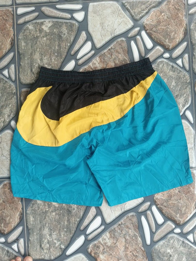 Nike big swoosh short (woven) (Category: Activewear) located in Baggao. Submitted by thriftislife123 (Listing ID 1460509817, Image 3). Description: w: freesize l:18 leg open:12 issue:no washtag off/legit pm for more details.