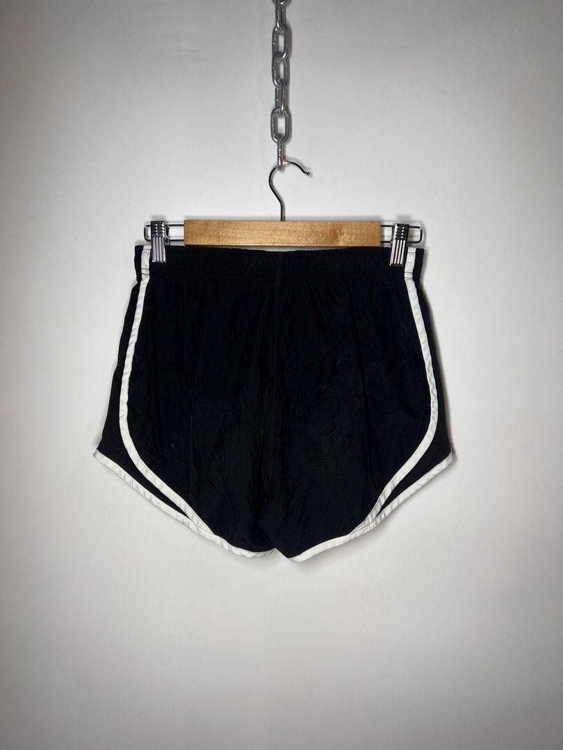 Nike Black Running Shorts with White Trim (Category: Activewear) located in Manila. Submitted by randsclothingstore (Listing ID 1460710488, Image 2). Description: BRAND: Nike Size (Inch) ‼️Medida Size‼️ : W 26-32 | L 10 Color Rate: 9.8/10 Condition: Like New Issue: None ‼️ Thrifted item — please manage your expectations, authenticity is not guaranteed (check photos for tags!) 🧼 Laundered & Ready to Wear — Item has been washed and prepped, so you