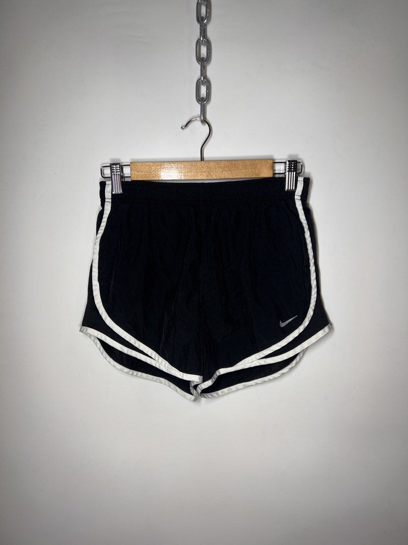 Nike Black Running Shorts with White Trim (Category: Activewear) located in Manila. Submitted by randsclothingstore (Listing ID 1460710488, Image 1). Description: BRAND: Nike Size (Inch) ‼️Medida Size‼️ : W 26-32 | L 10 Color Rate: 9.8/10 Condition: Like New Issue: None ‼️ Thrifted item — please manage your expectations, authenticity is not guaranteed (check photos for tags!) 🧼 Laundered & Ready to Wear — Item has been washed and prepped, so you