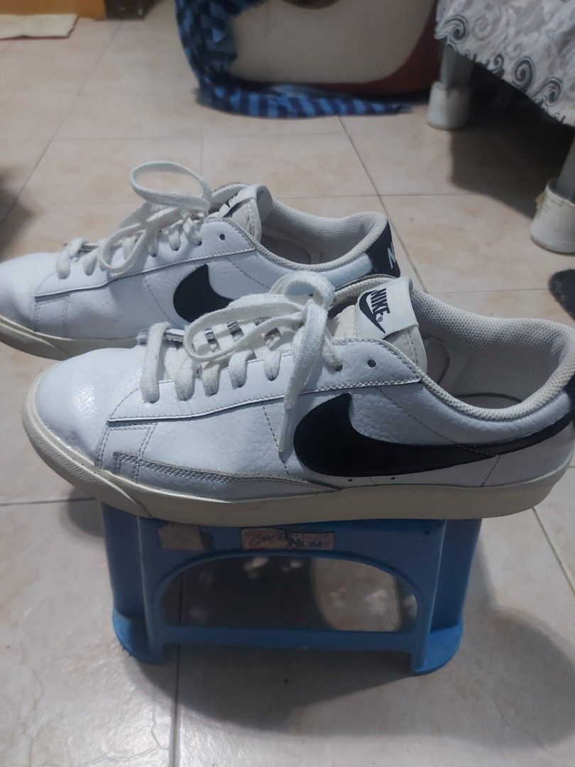 Nike Blazer Low White Black Leather Sneakers (Category: Sneakers) located in Pasig City. Submitted by junjunkobekobe (Listing ID 1460680261, Image 1). Description: Nike blazer low sail size 9 ORIGINAL, no box for only 1,500 pasig area pick-up or ship at buyers expense ty - Classic Nike Blazer Lows - White leather with black swoosh - Perfect for everyday wear - Soles show some wear but retain good grip - Clean laces - Essential addition to any sne