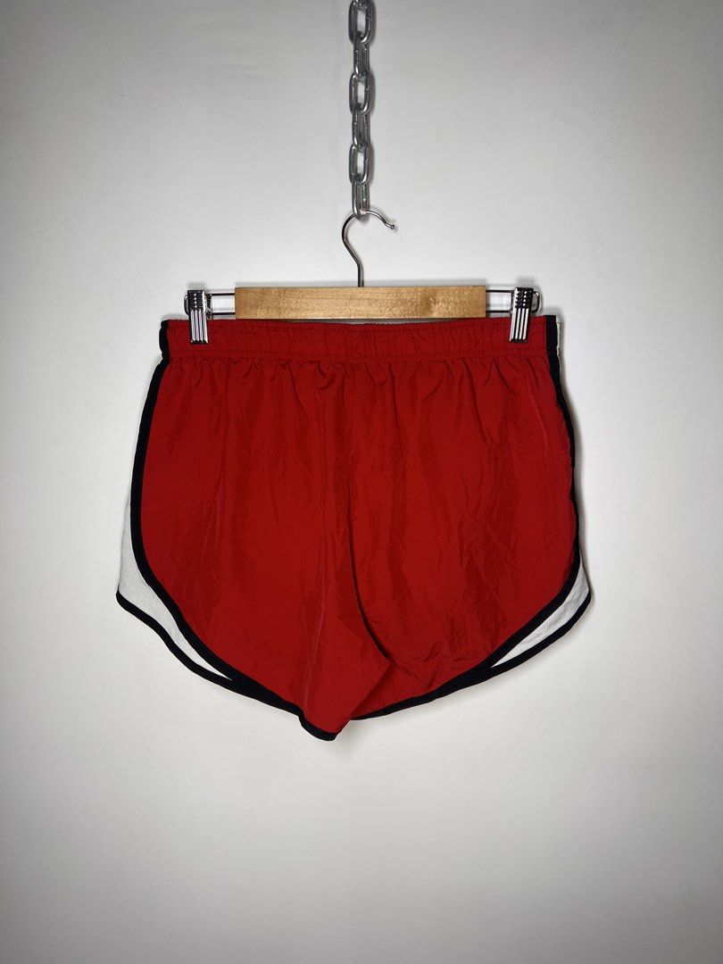 Nike Dri-FIT Red Running Shorts Size M (Category: Activewear) located in Manila. Submitted by randsclothingstore (Listing ID 1460710068, Image 2). Description: BRAND: Nike Size (Inch) ‼️Medida Size‼️ : W 28-34 | L 10.5 Color Rate: 9.8/10 Condition: Like New Issue: None ‼️ Thrifted item — please manage your expectations, authenticity is not guaranteed (check photos for tags!) 🧼 Laundered & Ready to Wear — Item has been washed and prepped, so you 