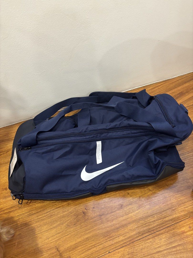 Nike Duffel Bag (Category: Other Sports Equipment and Supplies) located in Manila. Submitted by khloesmom (Listing ID 1460602030, Image 3). Description: Nike 60L Duffel Bag Brand New with Tag .