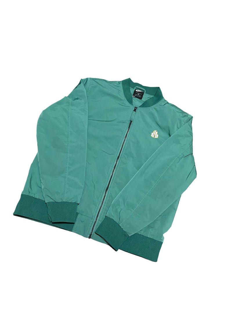 Nike Green Bomber Jacket with Colorful Logo (Category: Coats, Jackets and Outerwear) located in Baguio. Submitted by renrenpo (Listing ID 1460561774, Image 1). Description: BAGUIO LOC big logo nike varsity bomber 350 nego Large fitting length 26.5 width 22.5 10/10 color rate repaired stitching seen last pic.