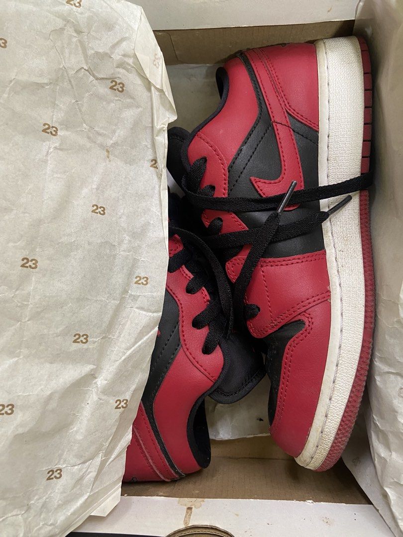 Nike Jordan 1 Low GS Reverse Breds (Category: Sneakers) located in Las Pinas. Submitted by zeiralliv (Listing ID 1460570026, Image 2). Description: Item Condition: Used with care. Needs cleaning. Stored in original box. Model: Air Jordan 1 Low (GS) Colorway: Gym Red / Black - White Style Code: 553560-606 Size: US 6.5Y (UK 6, EUR 39, CM 24.5) *kids sizing but can fit US W8* RFS: Decluttering Selling for 2.5k OBO Location: Las Piñas City Buyer shou