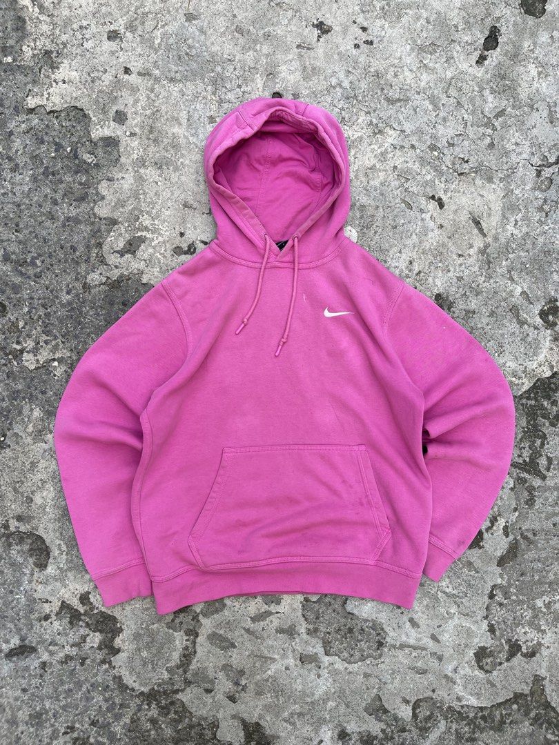 Nike Pink Hoodie (Category: Coats, Jackets and Outerwear) located in Cavite. Submitted by vlblgrmnts_ (Listing ID 1460627613, Image 1). Description: - Classic Nike hoodie in a vibrant bright pink. - Features the iconic embroidered Nike swoosh logo on the chest. - Includes a convenient front kangaroo pocket. - Adjustable drawstring hood for a customizable fit. - Ideal for everyday casual wear or active workouts. - Offers both comfort and style. Ni