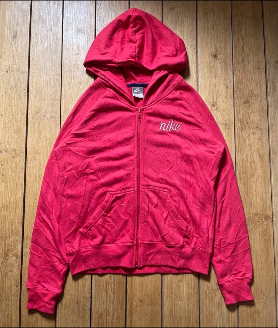 Nike Pink Zip-Up Hoodie Jacket (Category: Coats, Jackets and Outerwear) located in Manila. Submitted by tygaangub1096 (Listing ID 1460653075, Image 1). Description: - Pink Nike Zip-Up Hoodie - Size: Medium (M) - 19 width 24 length - Classic embroidered Nike logo on chest - Two functional front pockets - Ideal for casual wear or workouts - Comfortable and stylish design - Add shipping fee.