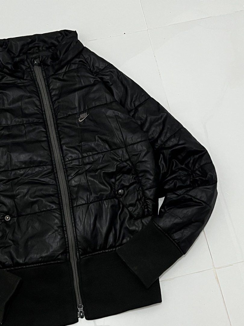 Nike quilted puffer jacket (Category: Coats, Jackets and Outerwear) located in Manila. Submitted by tripnimichael (Listing ID 1460692226, Image 2). Description: 18x23 Color rate 9/10 Condition 9/10 No issue .