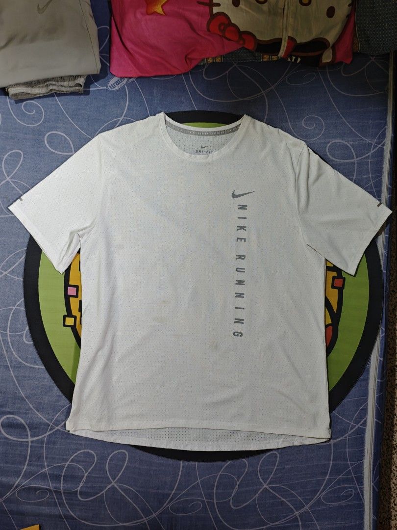 NIKE Running Aspack (Category: Activewear) located in San Pedro. Submitted by streetthriftsph (Listing ID 1460630399, Image 2). Description: Nike Running Aspack 1150+SF Nike Running Div. Breathable Shirt 9/10 Condition XL 22x28 9/10 Print 9/10 Colorate Nike Running Form Drifit Pants 9/10 Condition Medium 29 WL garterized fits 30-35 38 Length 9/10 Colorate Ankle zips.