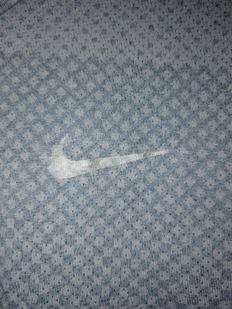 Nike running shirt (Category: Tshirts & Polo Shirts ) located in Manila. Submitted by kenny200024 (Listing ID 1460524657, Image 3). Description: Nike running shirt - size medium - width 18 | length 26 - good condition.