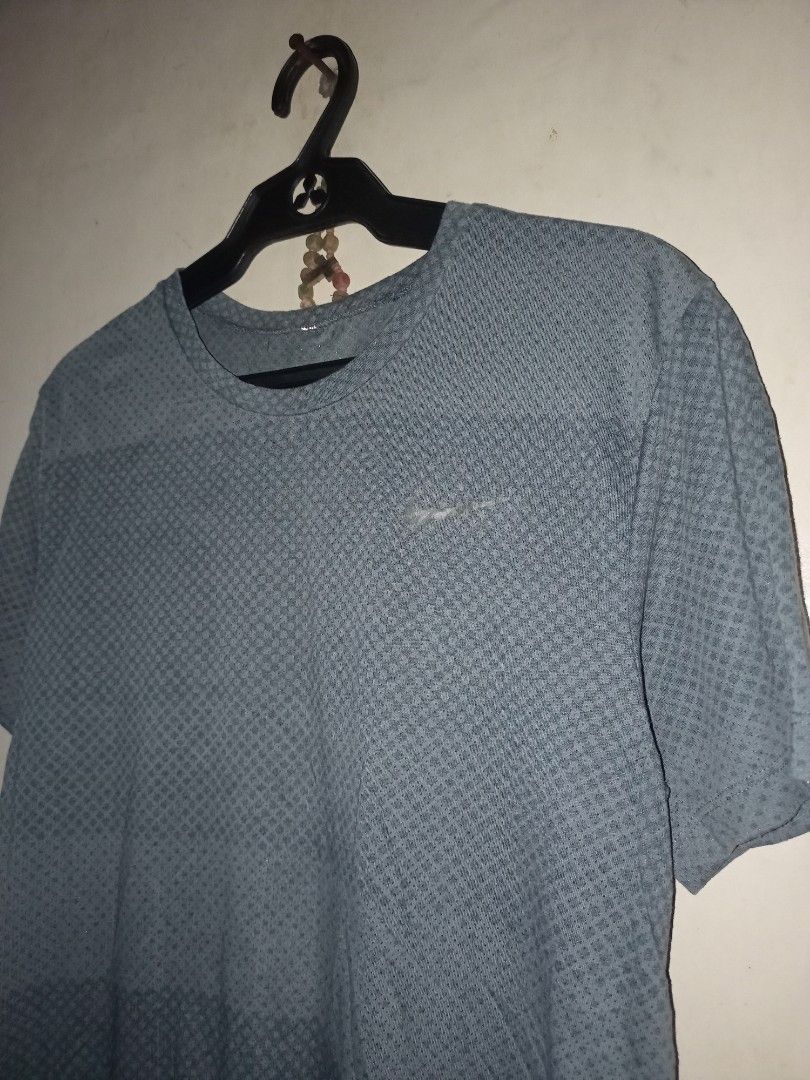 Nike running shirt (Category: Tshirts & Polo Shirts ) located in Manila. Submitted by kenny200024 (Listing ID 1460524657, Image 2). Description: Nike running shirt - size medium - width 18 | length 26 - good condition.