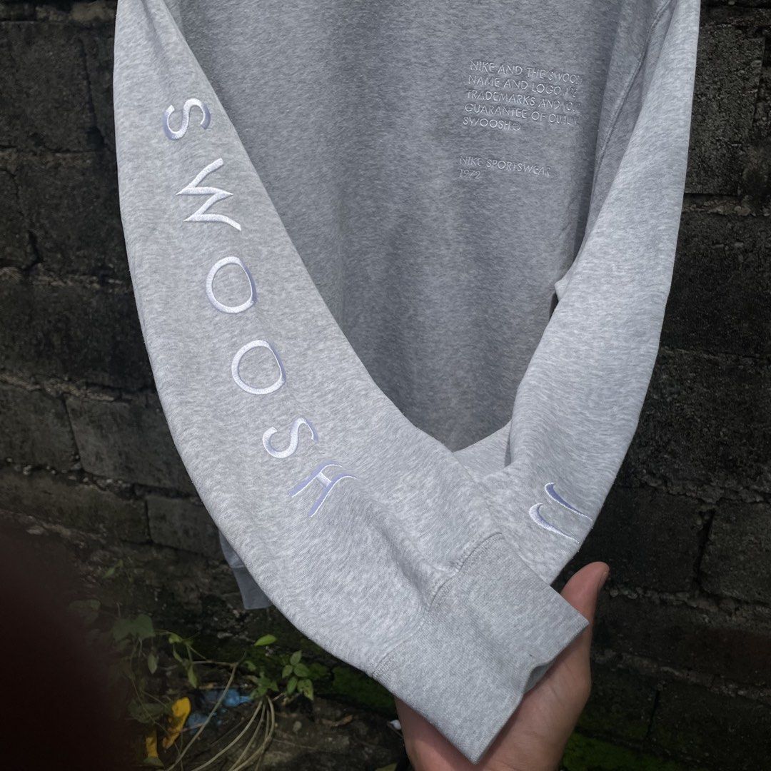 Nike Swoosh Crewneck (Category: Coats, Jackets and Outerwear) located in Urdaneta. Submitted by rthrift_shop19 (Listing ID 1460684690, Image 2). Description: Width: 24.5” Length: 27.5” Condition 9/10 Color Rate 9/10 Mode of Payment: Gcash, Gotyme, Bank Transfer Delivery via J&T Express.