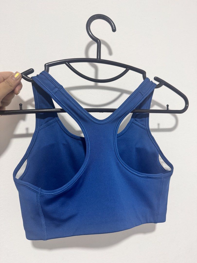 Nike Swoosh Medium Support Sports Bra (Category: Activewear) located in Quezon City. Submitted by healingmyinnerchild (Listing ID 1460533785, Image 2). Description: - Royal blue Nike sports bra - Racerback design for full range of motion - Dri-Fit technology keeps you dry - Size L (75C) - Removable Pads.