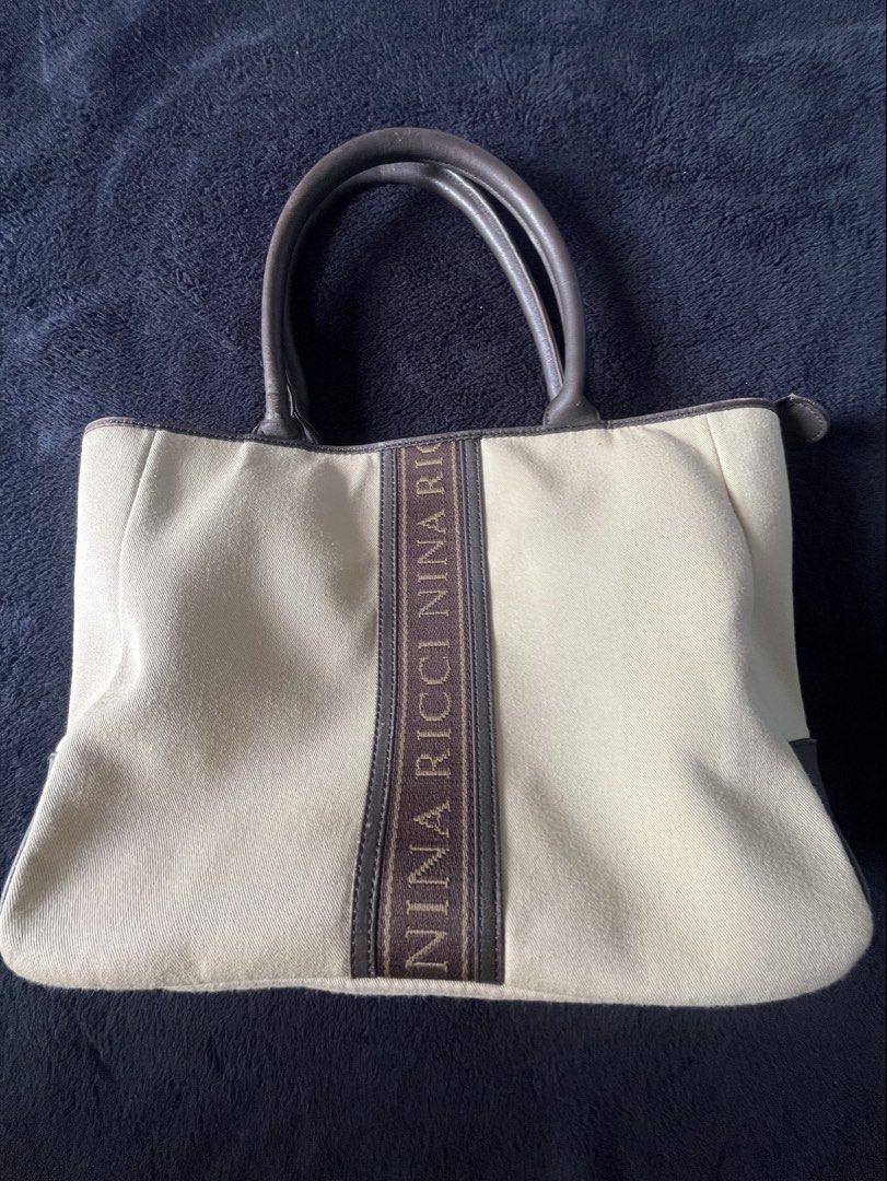Nina Ricci Canvas Handbag (Category: Shoulder Bags) located in Manila. Submitted by _stylefinds_ (Listing ID 1460542571, Image 1). Description: .