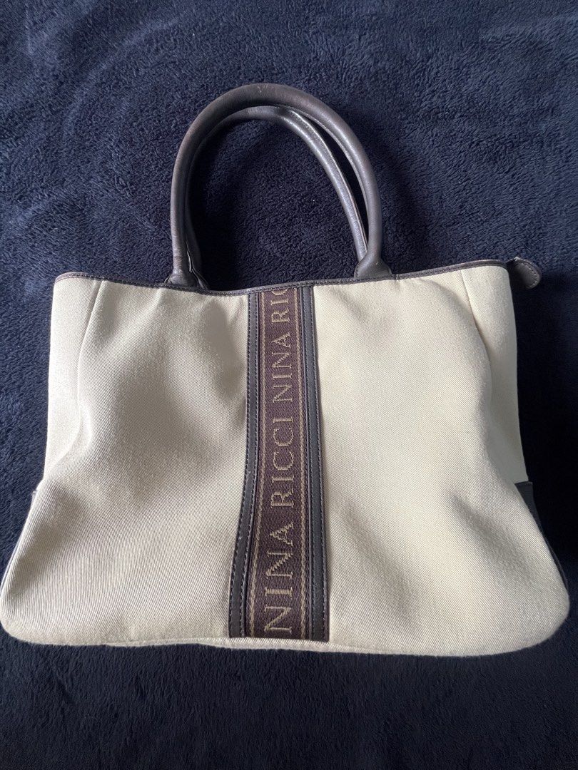 Nina Ricci Medium Handbag (Category: Tote Bags) located in Manila. Submitted by swift_tiny_treasure (Listing ID 1460554086, Image 1). Description: .