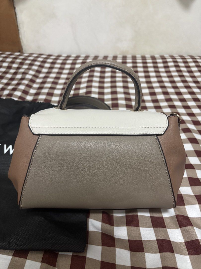 Nine West Sling Bag (Category: Cross-body Bags) located in Manila. Submitted by arenas.clang (Listing ID 1460669376, Image 2). Description: 👜 **FOR SALE: Almost New Nine West Sling Bag** ✨ Condition:Almost new / excellent condition 🛍️ Purchased: July 2026 via Nine West Flagship Store on Orange App 💰 Original Price:Around 4,000+ 🏷️ **Selling Price:2,000 — negotiable for a sure buyer Inclusions: • Sling bag with strap • Original dust bag • Orig