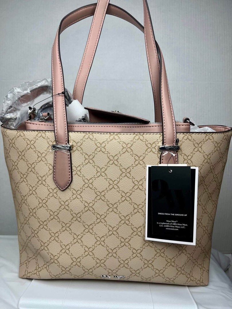 Nine West Tote Bag with Pouch (Category: Tote Bags) located in Caloocan City. Submitted by sizzies_fashion_style (Listing ID 1460510975, Image 2). Description: - Beige Nine West tote bag - Pink trim and matching pink pouch included - All-over Nine West logo pattern - Pink straps - Zip closure - Ideal for everyday use or travel.