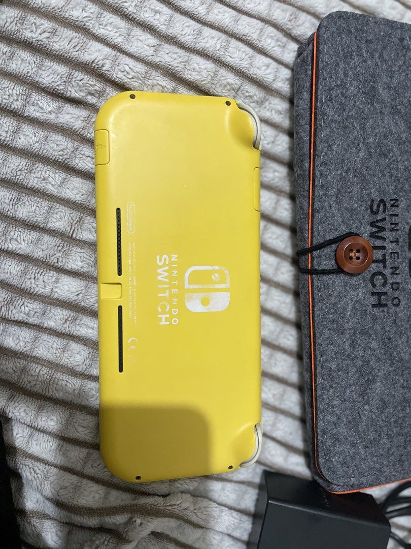 Nintendo Switch Lite RUSH SALE!!! (Category: Nintendo) located in Manila. Submitted by keydddfps (Listing ID 1460687083, Image 3). Description: Comes with original charger and travel pouch! .