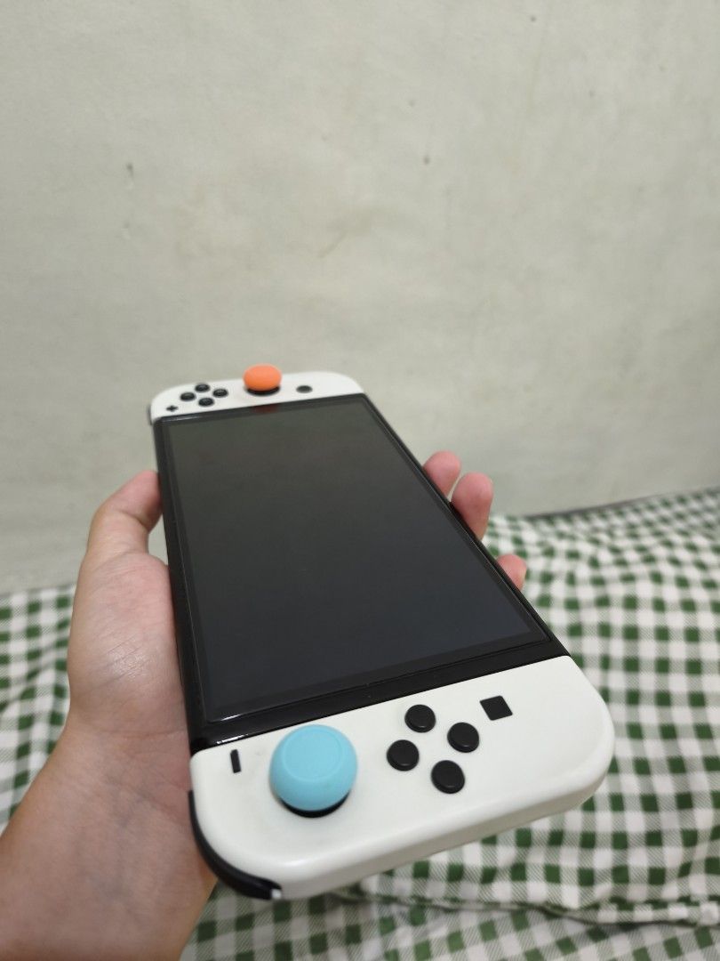 (Still available‼️) Nintendo Switch OLED White w/ Accessories & Assassin's Creed Game (Category: Nintendo) located in Cainta. Submitted by mae096 (Listing ID 1460690670, Image 3). Description: FOR SALE NS SWITCH OLED for a very AFFORDABLE PRICE Date of Purchase: Feb 28, 2025 Inclusion: ✅ NS OLED Console (with screen protector) ✅ Original NS Charger ✅ Original Joycon controllers ✅ Original NS Dock ✅ Original Joy Con Grip ✅ Original Joy Con Wrist S