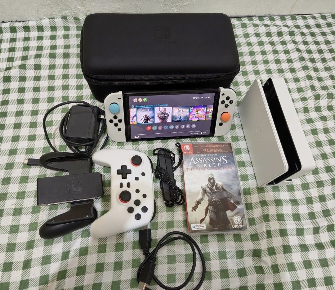 (Still available‼️) Nintendo Switch OLED White w/ Accessories & Assassin's Creed Game (Category: Nintendo) located in Cainta. Submitted by mae096 (Listing ID 1460690670, Image 1). Description: FOR SALE NS SWITCH OLED for a very AFFORDABLE PRICE Date of Purchase: Feb 28, 2025 Inclusion: ✅ NS OLED Console (with screen protector) ✅ Original NS Charger ✅ Original Joycon controllers ✅ Original NS Dock ✅ Original Joy Con Grip ✅ Original Joy Con Wrist S