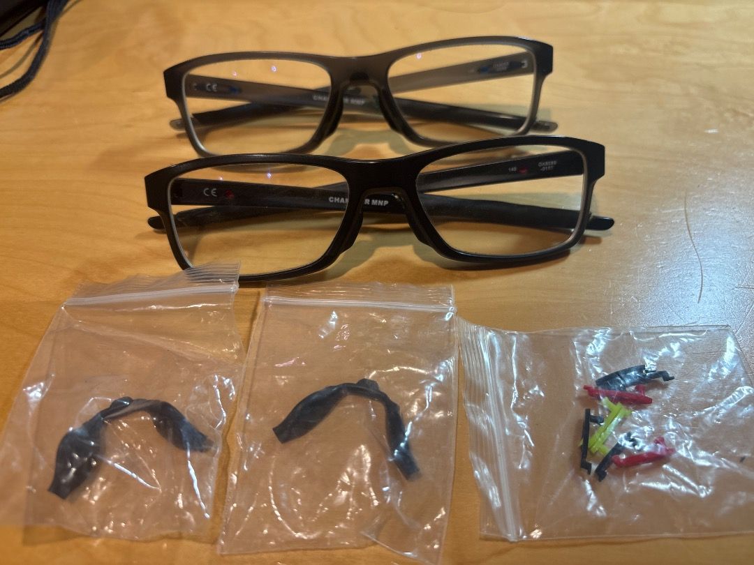 Oakley Chamfer Frames (Category: Sunglasses & Eyewear) located in Singapore. Submitted by rsimzy (Listing ID 1460636347, Image 1). Description: - Brand: Oakley - Model: Chamfer Frames (each $70 willing to nego) - Condition: Good, lenses can be removed for prescription lenses 2 Colours available , Grey and Black frames with interchangeable nose pads and “O” logo pieces .