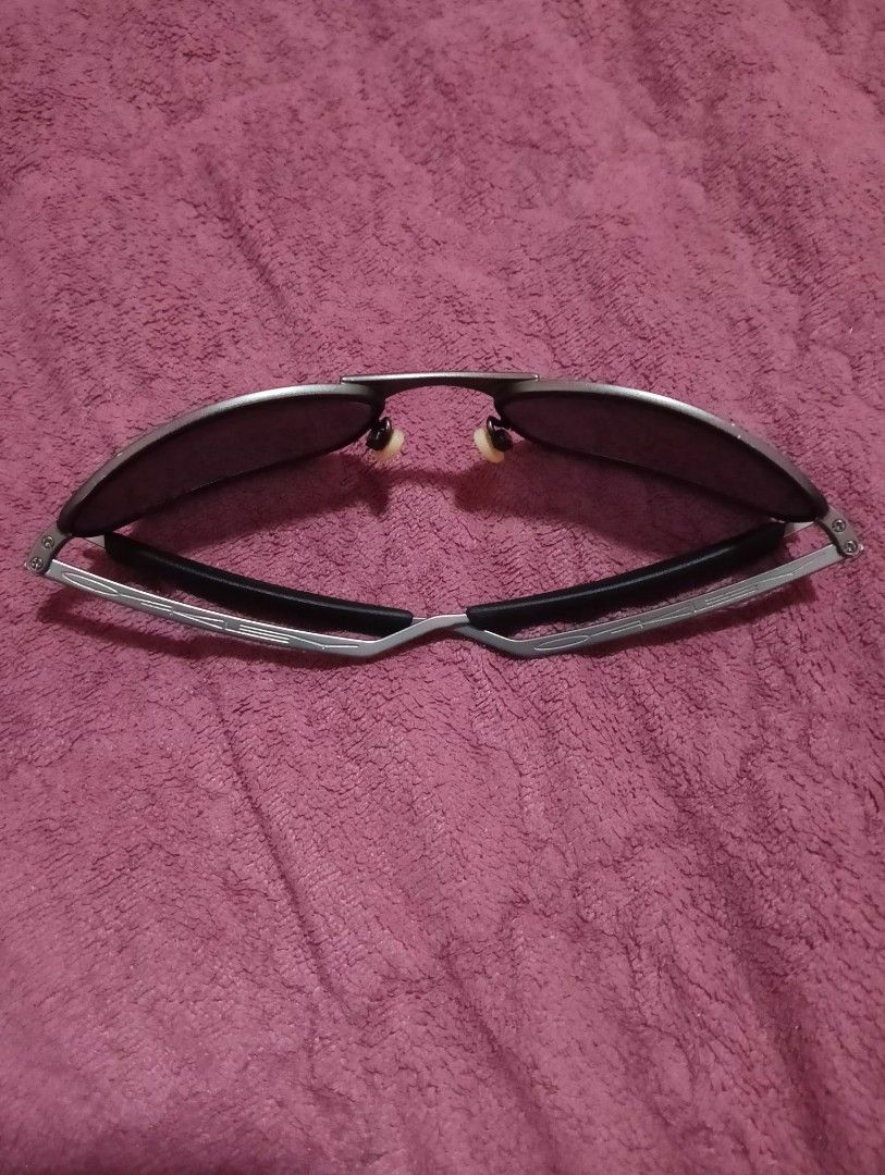 Oakley E wire OG (Category: Sunglasses & Eyewear) located in Libona. Submitted by ooaakklleeyy (Listing ID 1460557650, Image 2). Description: -E wire OG. -Wearable condition. -Issue: Stretched, still wearable. -Original polarized lens, flaking lens or peeling. -No original case, pair only, but will provide an alternative case and pouch..