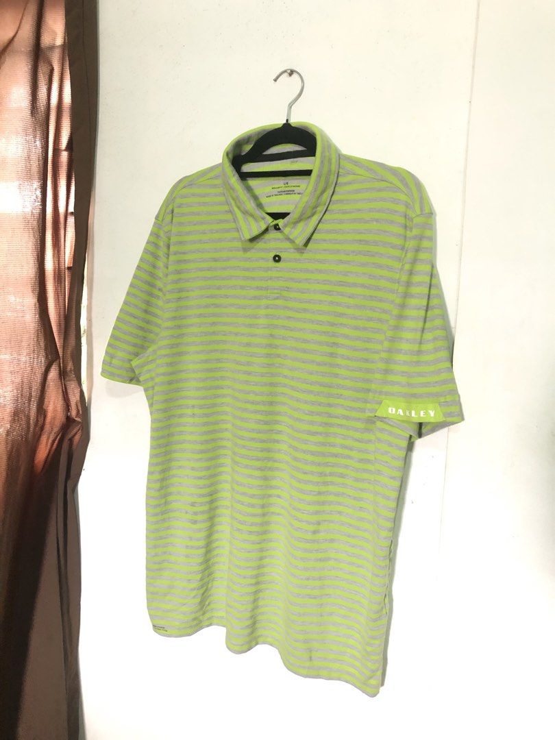 OAKLEY GOLF POLO SHIRT STRIPES (Category: Activewear) located in Manila. Submitted by triptothrift7 (Listing ID 1460672925, Image 2). Description: pm me for fast transaction! OAKLEY GOLF POLO SHIRT STRIPES for only 1000 size large on tag width 21.5 x 29 length no issue excellent condition color rate 9/10 mode of payment gcash or bank transfer location Biñan laguna.