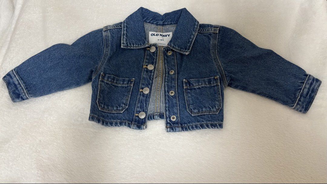 Old Navy Denim Jacket 12-18 Months (Category: Babies & Kids Fashion) located in Manila. Submitted by vfjdeclutter (Listing ID 1460536208, Image 1). Description: - Classic blue denim jacket from Old Navy - Button-up front - Two chest pockets - Perfect for layering - Ideal for a child's wardrobe - Size: 12-18 months.