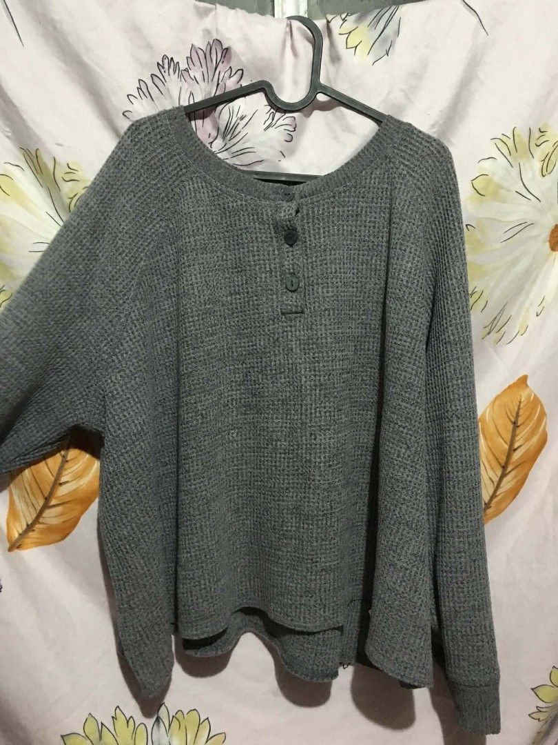 Old Navy Grey Waffle Knit Henley Sweater (Category: Coats, Jackets and Outerwear) located in Cavite. Submitted by jsmngrml18 (Listing ID 1460707870, Image 3). Description: - Brand: Old Navy - Color: Grey - Material: Waffle knit - Fit: Relaxed - Sleeves: Long - Neckline: Henley with 2 buttons - Style: Comfortable, casual, great for layering.