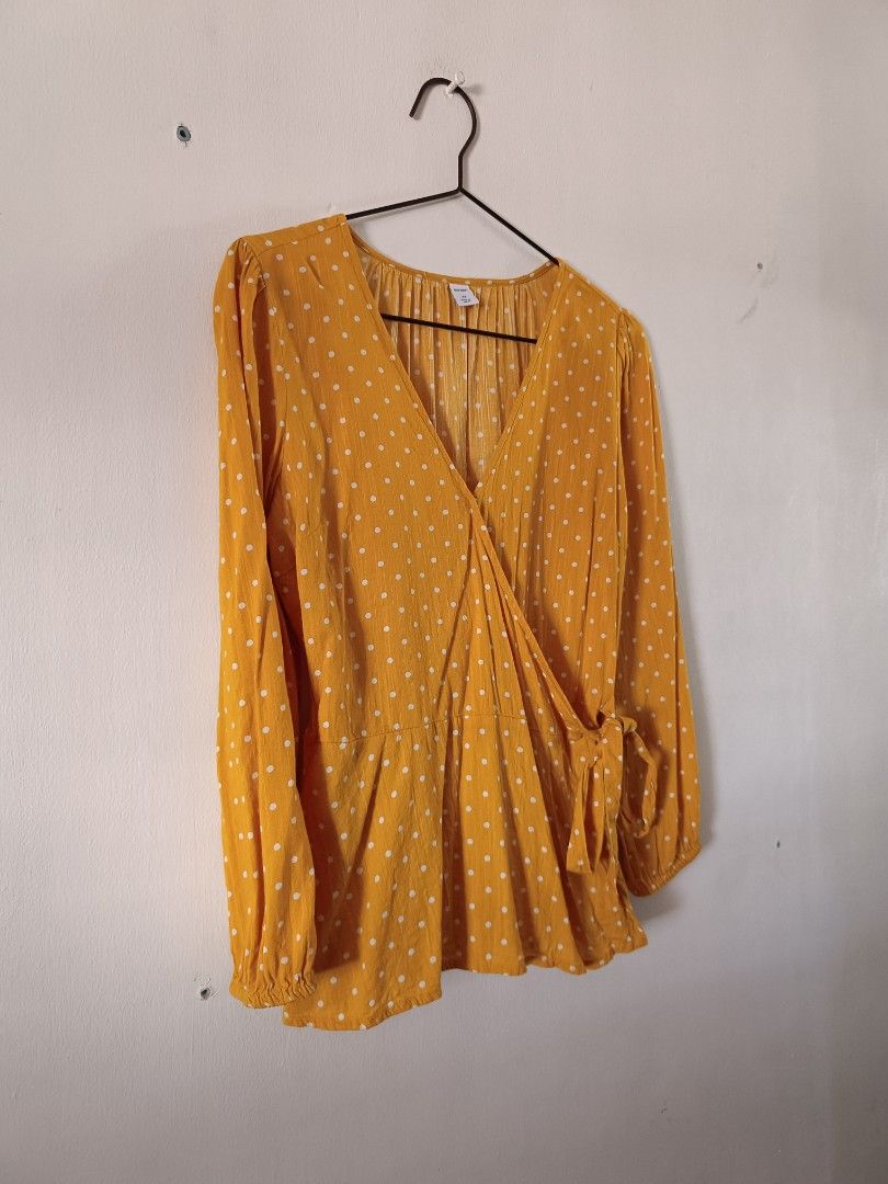 Old Navy Yellow Polka Dot Wrap Peplum Blouse (Category: Blouses) located in Manila. Submitted by shajanina.14 (Listing ID 1460541292, Image 3). Description: Old Navy Original Preloved As good as new Extra Small on tag As per measuring tape, Bust- up to 38 inches Waist- up to 34 inches Length- 24 inches .