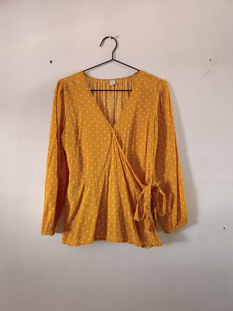 Old Navy Yellow Polka Dot Wrap Peplum Blouse (Category: Blouses) located in Manila. Submitted by shajanina.14 (Listing ID 1460541292, Image 2). Description: Old Navy Original Preloved As good as new Extra Small on tag As per measuring tape, Bust- up to 38 inches Waist- up to 34 inches Length- 24 inches .