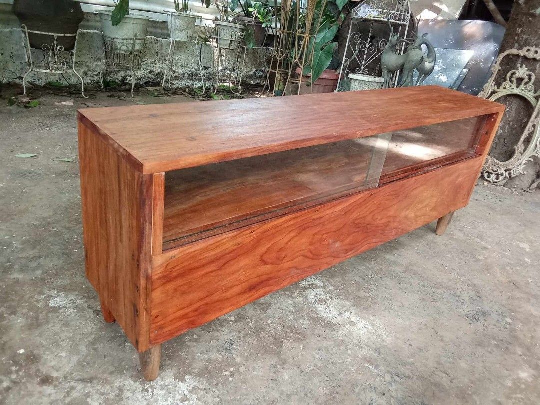 Old TV Stand (Category: TV Consoles) located in Rizal. Submitted by mommykiee (Listing ID 1460512817, Image 3). Description: Old TV stand Made of solid narra wood Size: L48 W10 H19inch. Stripped & varnished.